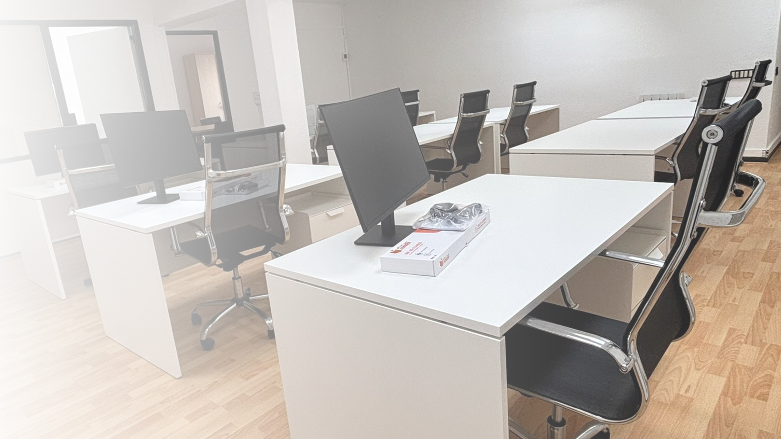Boardroom with screen and seating at the EuroDataes offices.