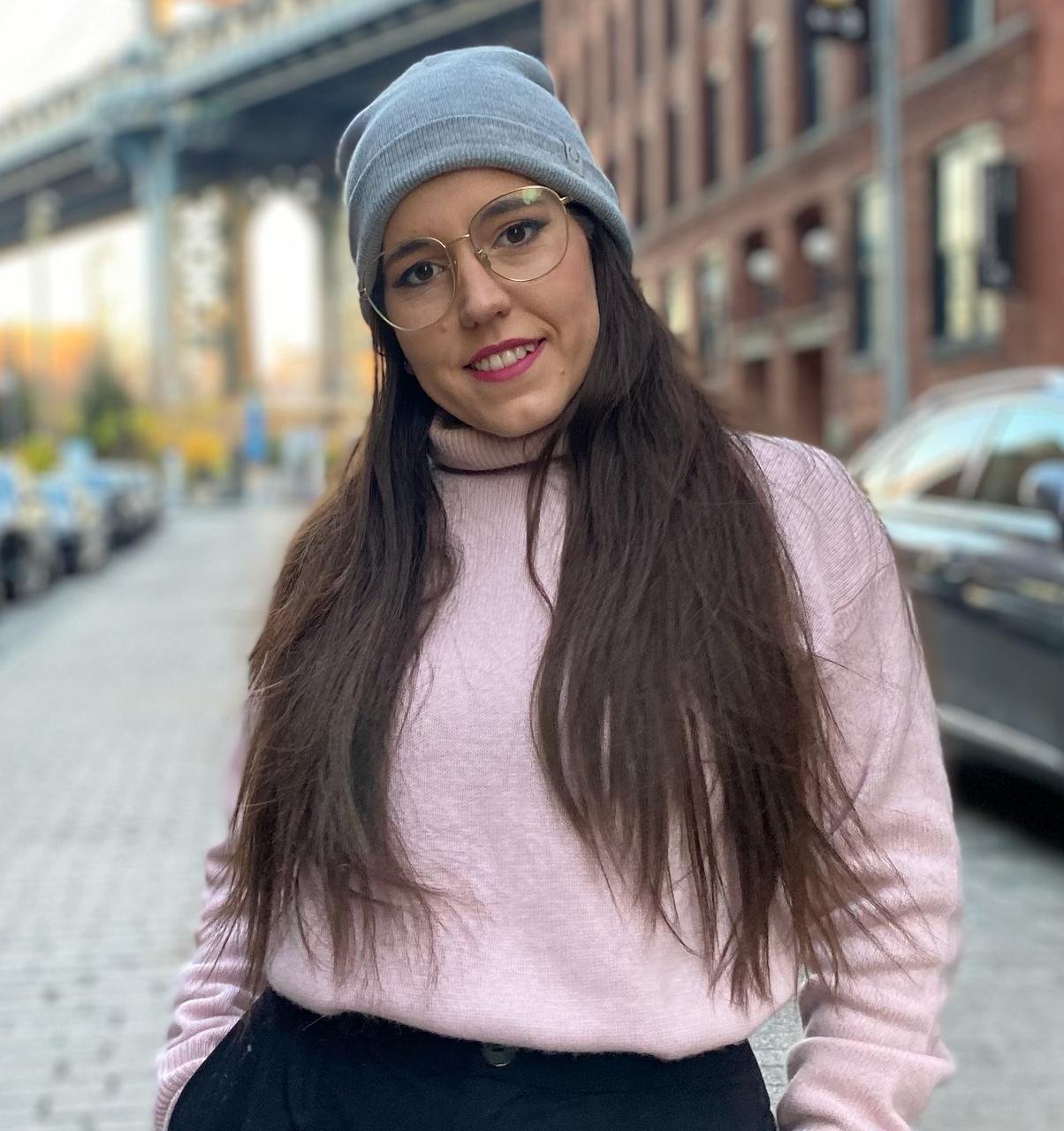 Portrait of Diveana Rodriguez, founder of Femia, photographed on the street.